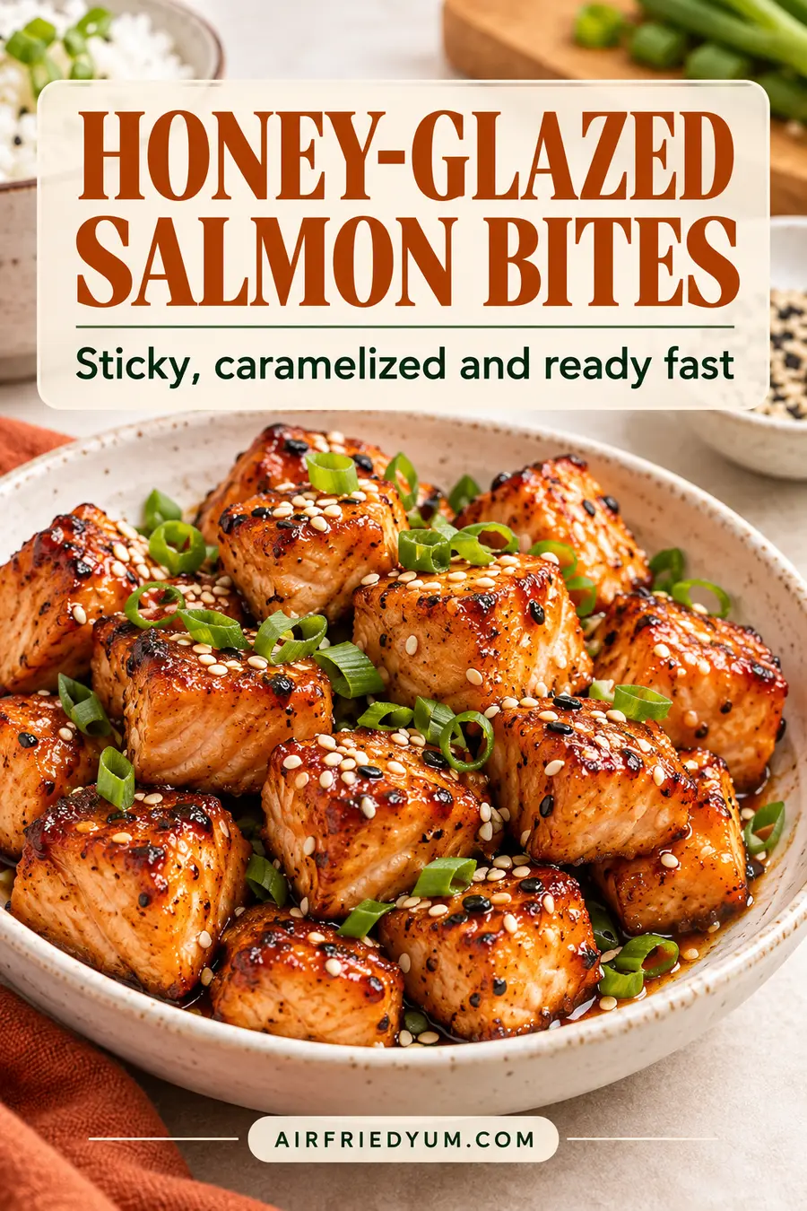 Pinterest pin for Air Fryer Honey-Glazed Salmon Bites with a realistic finished-dish photo and recipe headline